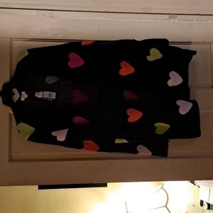 Women's navy coat sweater nwt. 52% rayon, 28% polyester, and 20% nylon.